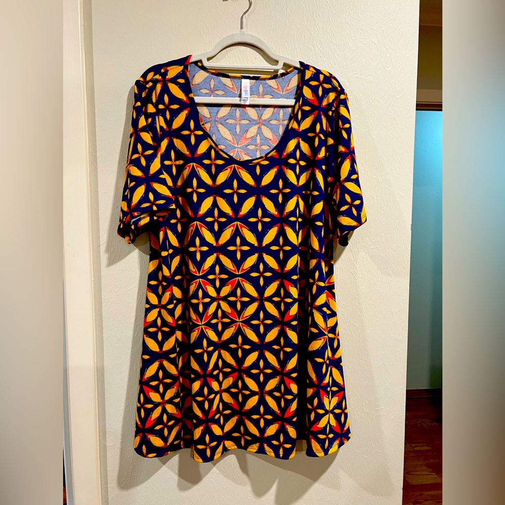 Lula Roe multi colored tunic. Size 2x. Excellent condition.